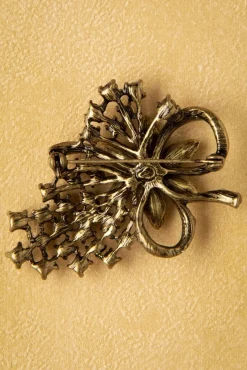 Melanie Broche In Goud En Zeeschuimgroen