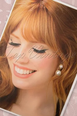 Stijlvolle Pareloorbellen In Ivoor